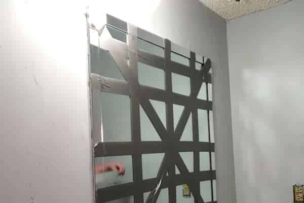 Cover the mirror using duct tape